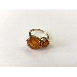 A 9ct gold dress ring set with Buriti Fire Opals (4.