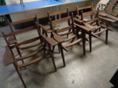 A set of ten wooden armchairs (no seat pads)