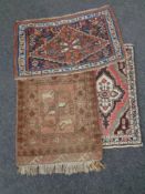 Three small Iranian rugs