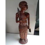 A carved hardwood tribal figure