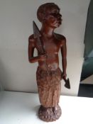 A carved hardwood tribal figure