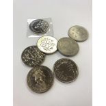 Seven £5 coins