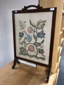 An Edwardian tapestry fire screen