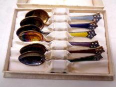 A boxed set of six Norwegian silver and enamel teaspoons