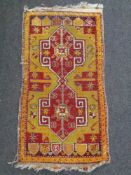 A Caucasian Kazak rug,