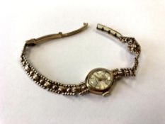 A lady's 9ct gold Swiss Empress wristwatch on 9ct gold bracelet CONDITION REPORT: