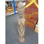 A carved tribal figure