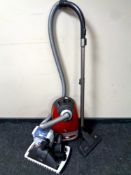 A Meile cat and dog TT5000 vacuum with accessories and bags