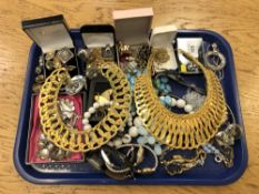A tray of costume jewellery, gilt necklaces,