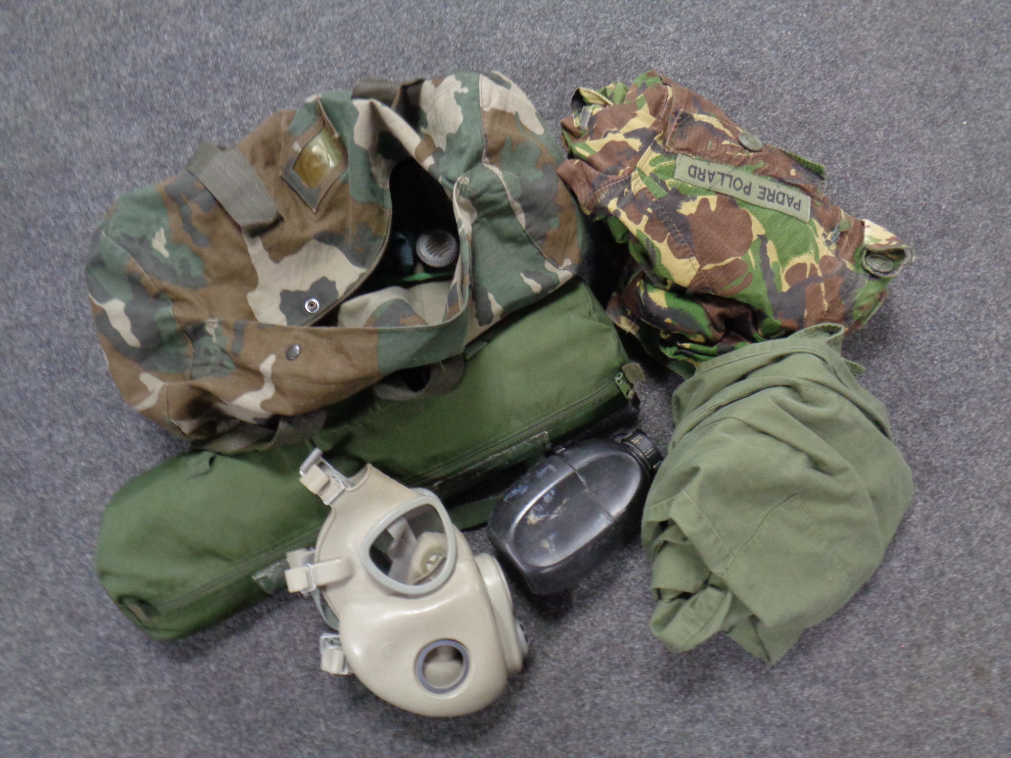 Two bags containing British military equipment to include uniform, drinks canteen,