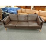 A Danish Mobler three seater settee in brown leather