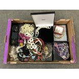 A box of costume jewellery, bead necklaces,