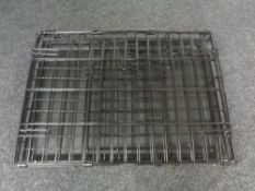 A folding dog cage