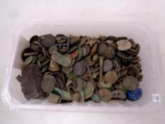 A tub containing a quantity of metal detector finds