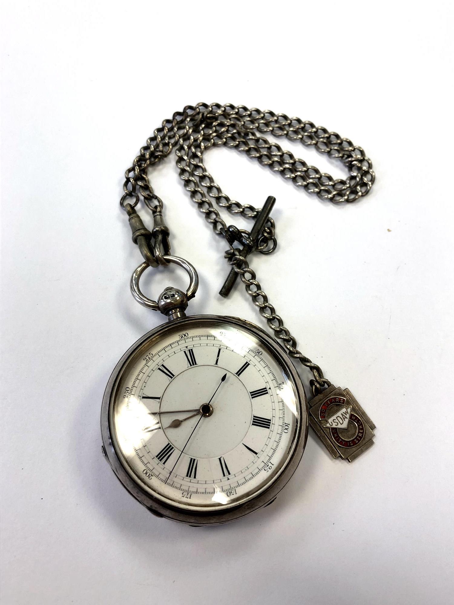 A silver chronograph on silver Albert chain CONDITION REPORT: In going order.