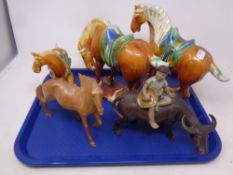 A tray containing Chinese ceramic Tang style horses, figure of a girl,
