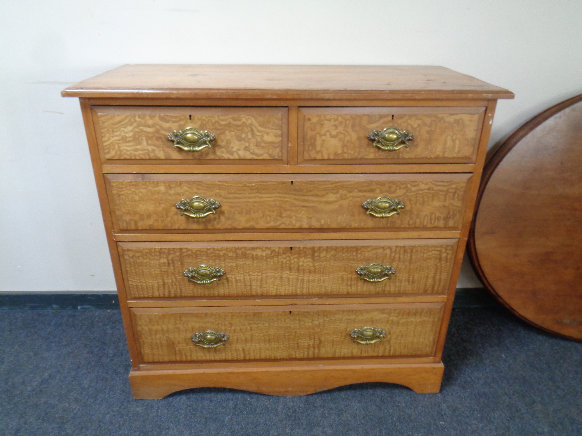 An Edwardian five drawer chest
