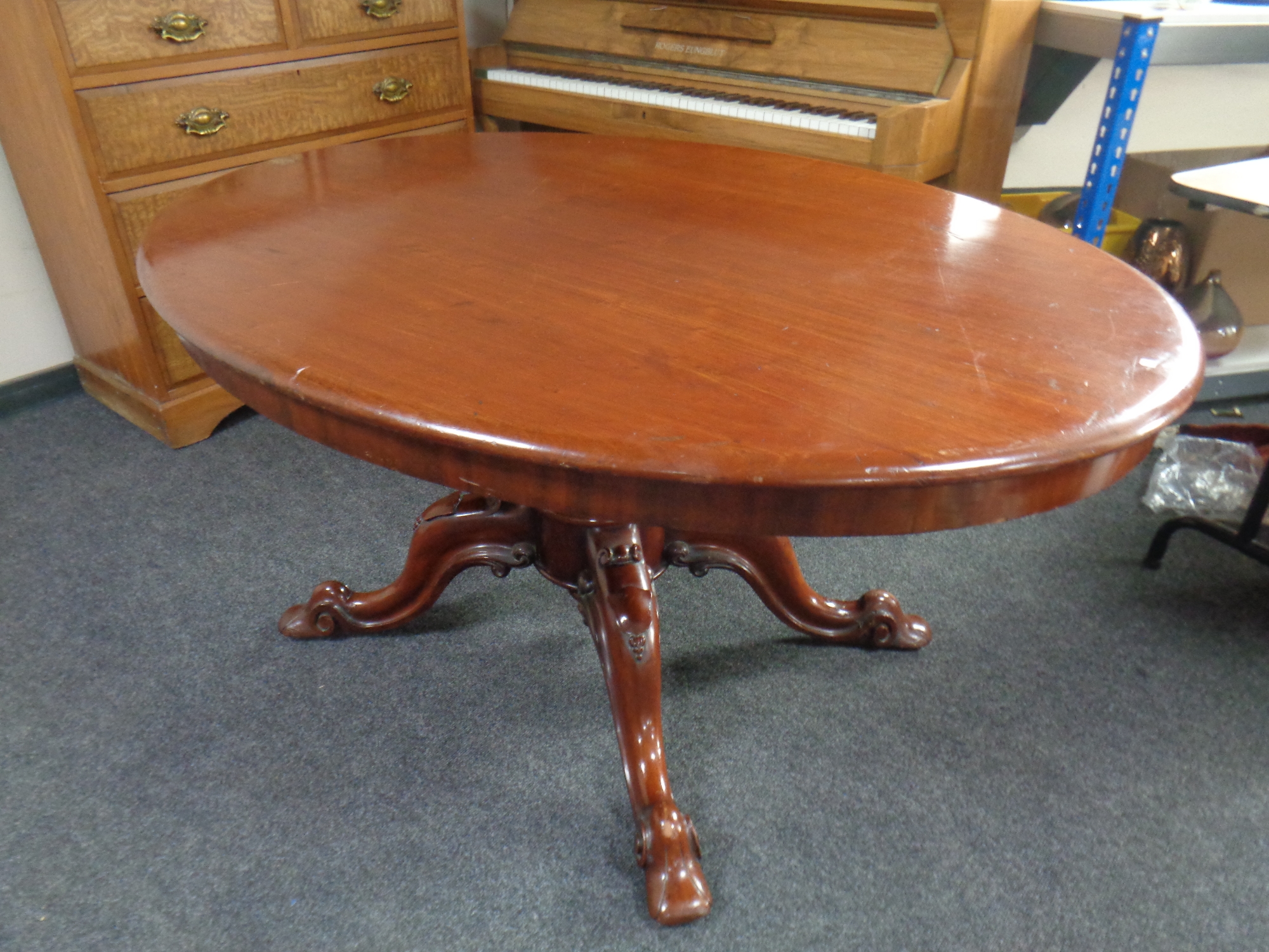 A Victorian mahogany oval pedestal breakfast table