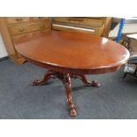 A Victorian mahogany oval pedestal breakfast table