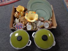 Two enamelled cooking pots together with a box of tea china