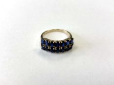 A 9ct gold dress ring set with blue Tibetan Kyanite stones (2.67ct), size P.