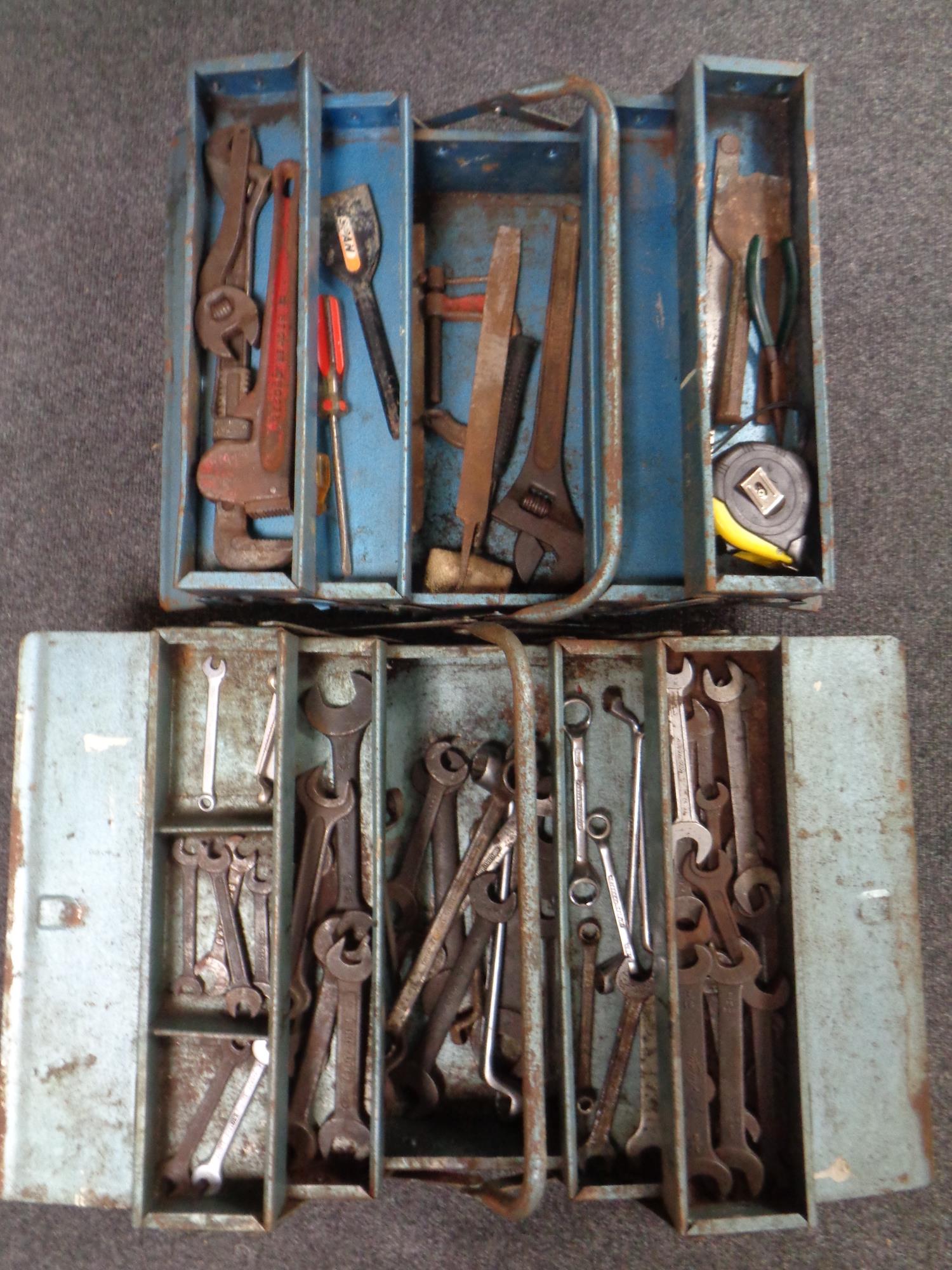 Two metal concertina tool boxes containing Imperial spanners etc