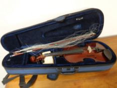 A half size student violin in case