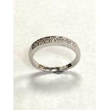 An 18ct white gold diamond half eternity ring, approximately 0.