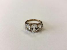 A 9ct gold dress ring set with goshenite, size N. CONDITION REPORT: 2.