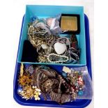 A tray of costume jewellery, beaded necklaces, wrist watch,