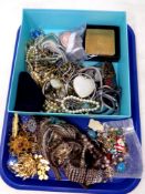 A tray of costume jewellery, beaded necklaces, wrist watch,