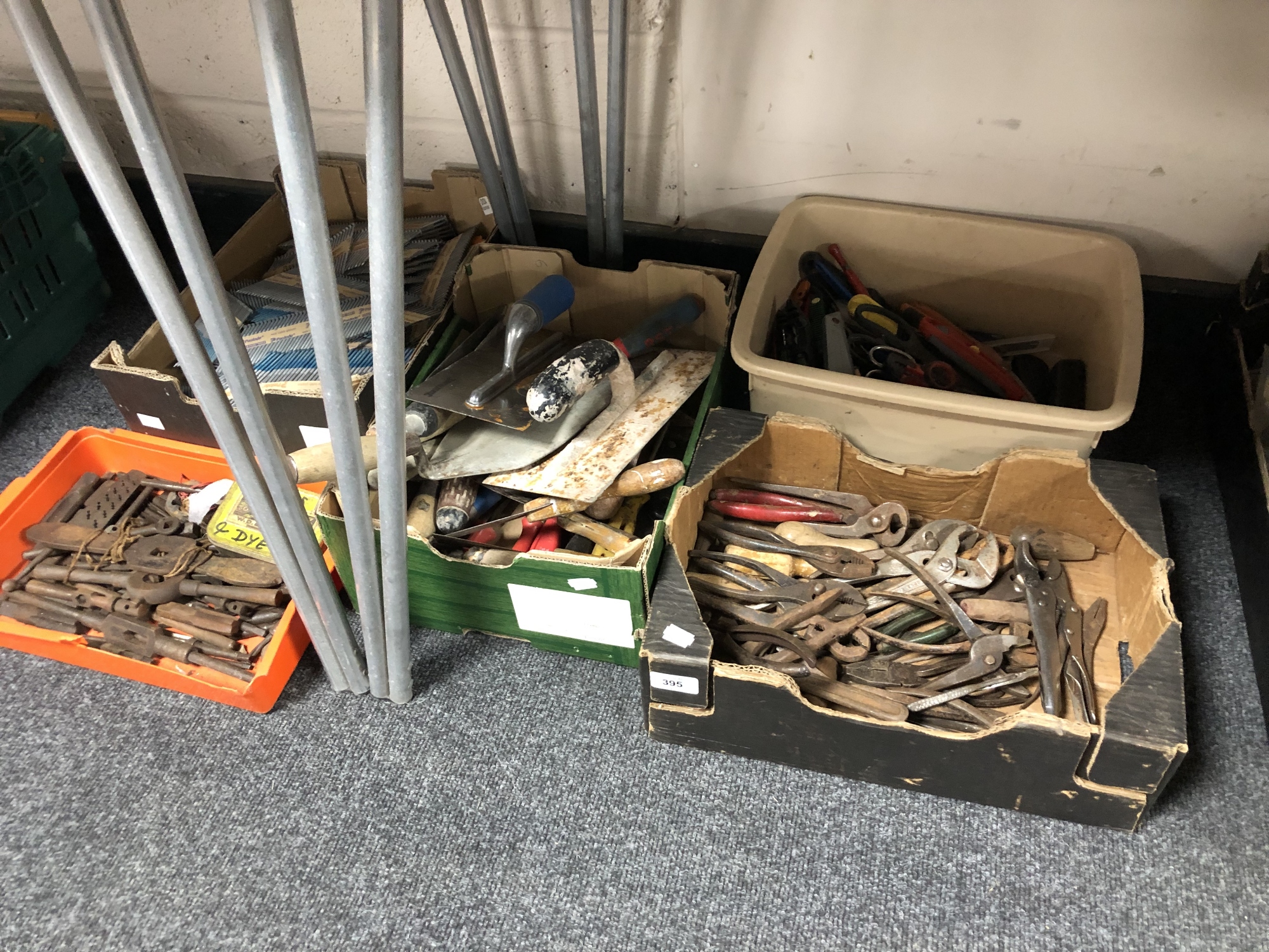 Five boxes and crates containing tap and die sets, scissors, Stanley knives, pliers,