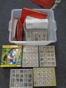 A box containing transparent microscope treasures of the earth magazines and folders,