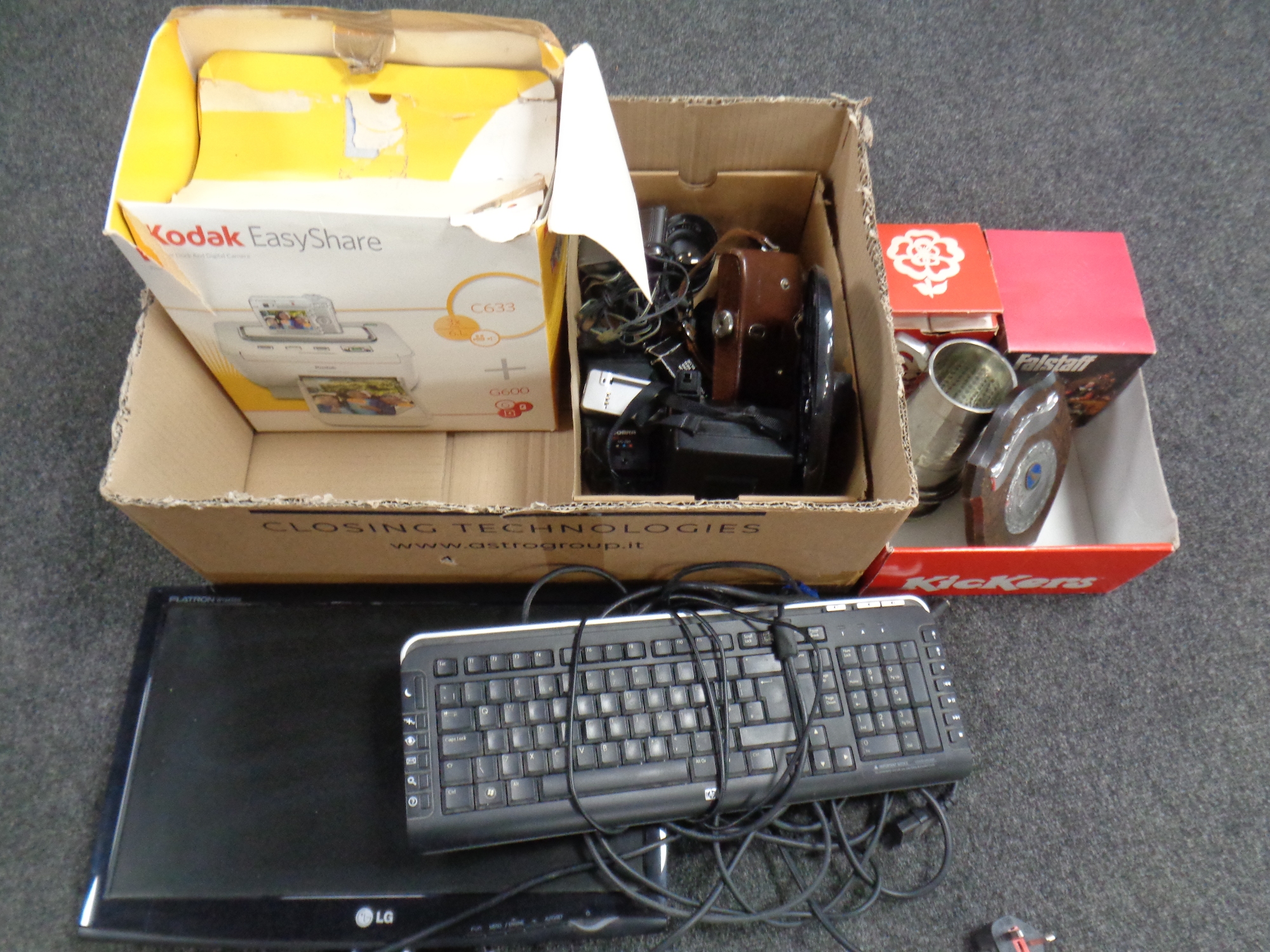 A box of cameras, LG monitor with keyboard, Kodak printer, further box of metal wares,
