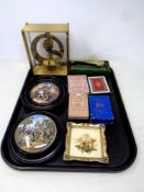 A tray of brass cased Kundo mantel clock, assorted playing cards,