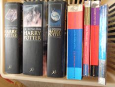 A basket of seven Harry Potter volumes