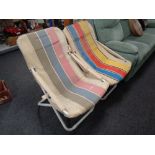 Two 20th century metal and fabric folding garden lounger chairs