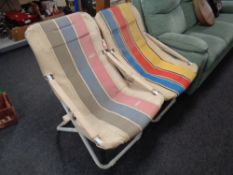 Two 20th century metal and fabric folding garden lounger chairs