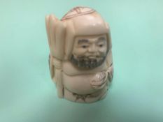 A Japanese bone carving - Man with Pot Belly.