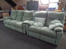 A G-Plan three seater settee and two seater settee upholstered in green fabric