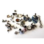 A quantity of silver jewellery including earrings, pendant and earrings set with abalone, charms,