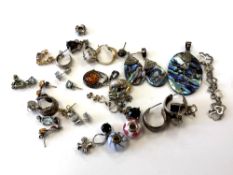 A quantity of silver jewellery including earrings, pendant and earrings set with abalone, charms,