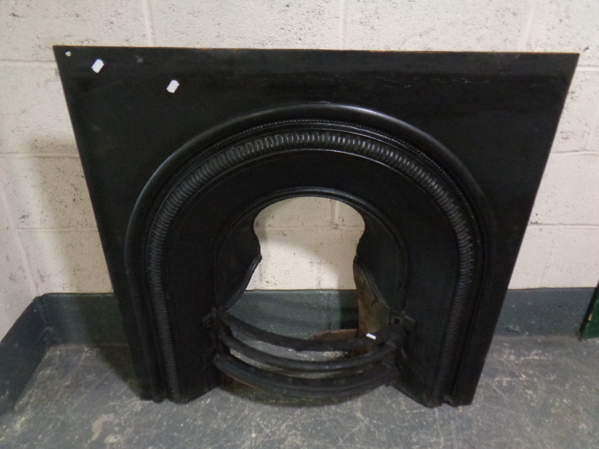 A cast iron fire insert