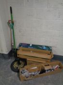 A quantity of gardening equipment to include electric hedge trimmer, push mower,