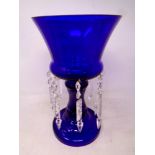 A blue glass table lustre