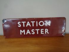 An enamelled Station Master sign