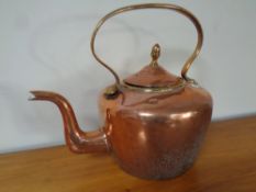 A Victorian copper kettle