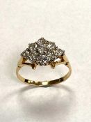 An 18ct diamond set fancy cluster ring