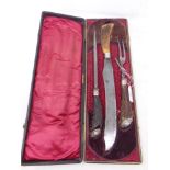 A Victorian three part carving set with antler handles by Thomas Turner & Co, Sheffield, cased.