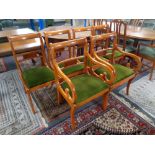 A set of six Yewwood dining chairs